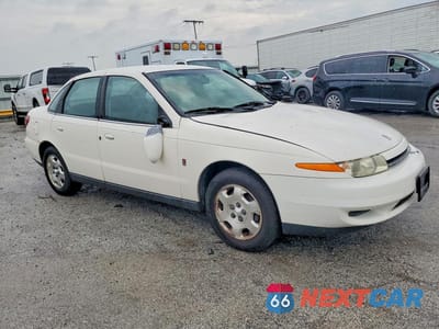 Czwarte zdjęcie samochodu z boku: 2002 SATURN L200 VIN:1G8JU54F12Y528553 - miniatura