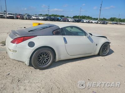 Trzecie zdjęcie samochodu z tyłu: 2004 NISSAN 350Z BASE VIN:JN1AZ34D94M104075 - miniatura