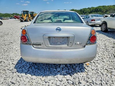 Zdjęcie 6 z 12 samochodu: 2003 NISSAN ALTIMA 2.5 VIN:1N4AL11D23C155581 - miniatura