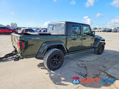 Trzecie zdjęcie samochodu z tyłu: 2021 JEEP GLADIATOR SPORT VIN:1C6HJTAG9ML580812 - miniatura