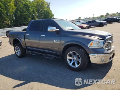 Czwarte zdjęcie samochodu z boku: 2017 RAM 1500 LARAMIE VIN:1C6RR7NT2HS567360 - miniatura