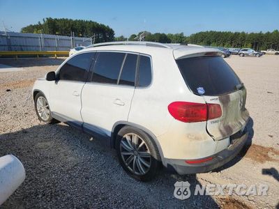 Drugie zdjęcie samochodu z przodu: 2014 VOLKSWAGEN TIGUAN S VIN:WVGAV3AX4EW624029 - miniatura