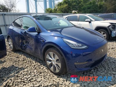 Czwarte zdjęcie samochodu z boku: 2021 TESLA MODEL Y VIN:5YJYGDEE8MF063817 - miniatura
