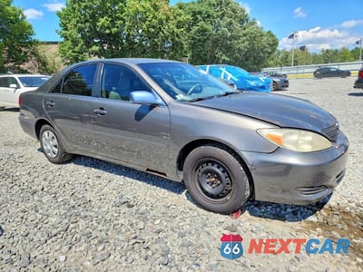 Czwarte zdjęcie samochodu z boku: 2003 TOYOTA CAMRY LE VIN:4T1BE32K03U733930 - miniatura