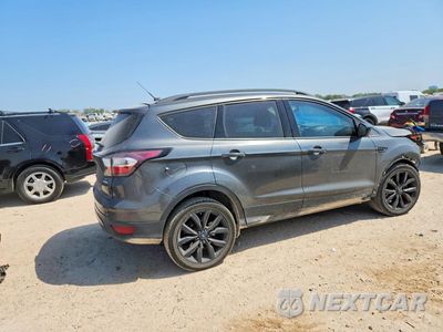 Trzecie zdjęcie samochodu z tyłu: 2017 FORD ESCAPE SE VIN:1FMCU0G99HUC65571 - miniatura