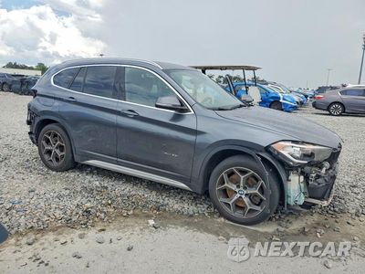 Czwarte zdjęcie samochodu z boku: 2017 BMW X1 XDRIVE28I VIN:WBXHT3C34H5F87860 - miniatura