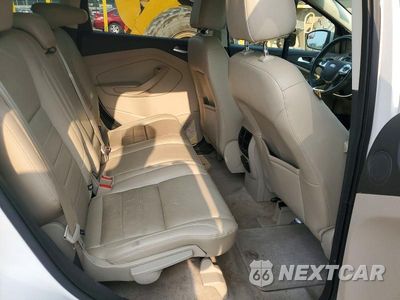 Zdjęcie 11 z 13 samochodu: 2014 FORD ESCAPE TITANIUM VIN:1FMCU0JX6EUC82556 - miniatura