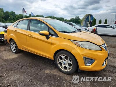 Czwarte zdjęcie samochodu z boku: 2011 FORD FIESTA SEL VIN:3FADP4CJ5BM121041 - miniatura