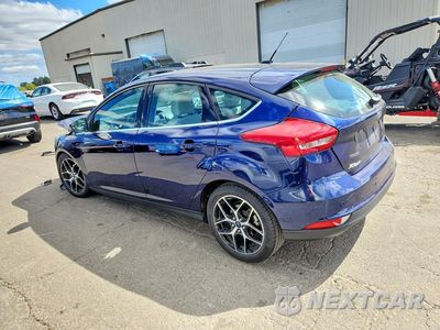 Drugie zdjęcie samochodu z przodu: 2017 FORD FOCUS TITANIUM VIN:1FADP3N28HL280128 - miniatura