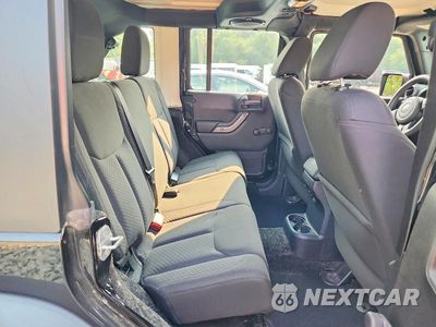 Zdjęcie 10 z 12 samochodu: 2014 JEEP WRANGLER UNLIMITED SPORT VIN:1C4BJWDG9EL232165 - miniatura