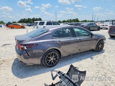 Trzecie zdjęcie samochodu z tyłu: 2022 TOYOTA CAMRY HYBRID SE VIN:4T1G31AK0NU598985 - miniatura