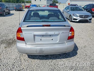 Zdjęcie 6 z 12 samochodu: 2002 HYUNDAI ACCENT GL VIN:KMHCG45CX2U391250 - miniatura