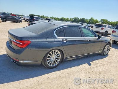 Trzecie zdjęcie samochodu z tyłu: 2016 BMW 740 I VIN:WBA7E2C51GG546632 - miniatura