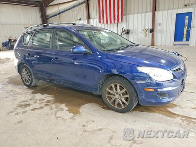 Czwarte zdjęcie samochodu z boku: 2012 HYUNDAI ELANTRA TOURING GLS VIN:KMHDC8AEXCU153432 - miniatura