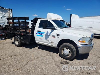 Czwarte zdjęcie samochodu z boku: 2012 RAM 3500 ST VIN:3C7WDSAT2CG100283 - miniatura