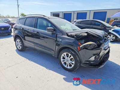 Czwarte zdjęcie samochodu z boku: 2018 FORD ESCAPE SE VIN:1FMCU9GD1JUC10644 - miniatura