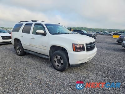 Czwarte zdjęcie samochodu z boku: 2013 CHEVROLET TAHOE K1500 LS VIN:1GNSKAE0XDR153317 - miniatura