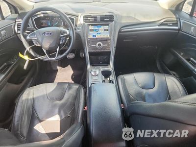Zdjęcie 8 z 12 samochodu: 2017 FORD FUSION TITANIUM VIN:3FA6P0K94HR270383 - miniatura