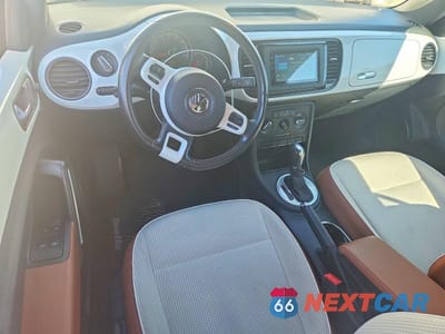 Zdjęcie 8 z 13 samochodu: 2017 VOLKSWAGEN BEETLE S/SE VIN:3VW517AT6HM821467 - miniatura