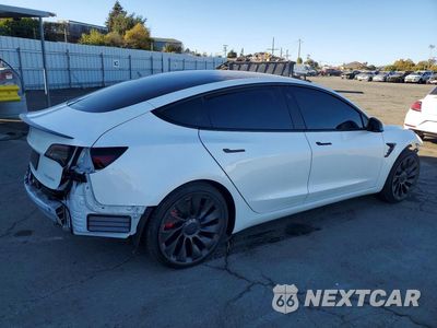 Trzecie zdjęcie samochodu z tyłu: 2023 TESLA MODEL 3 VIN:5YJ3E1EC1PF476261 - miniatura