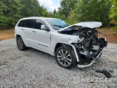 Czwarte zdjęcie samochodu z boku: 2018 JEEP GRAND CHEROKEE OVERLAND VIN:1C4RJECG7JC204823 - miniatura