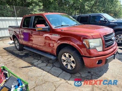 Czwarte zdjęcie samochodu z boku: 2014 FORD F150 VIN:1FTFW1CF3EKD09052 - miniatura