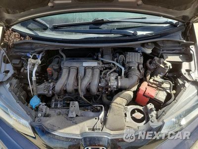 Zdjęcie 11 z 12 samochodu: 2017 HONDA FIT LX VIN:3HGGK5H54HM714097 - miniatura