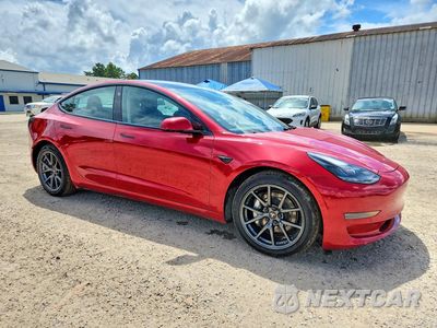 Czwarte zdjęcie samochodu z boku: 2022 TESLA MODEL 3 VIN:5YJ3E1EA9NF187639 - miniatura