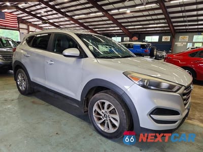 Czwarte zdjęcie samochodu z boku: 2016 HYUNDAI TUCSON SE VIN:KM8J23A49GU161463 - miniatura