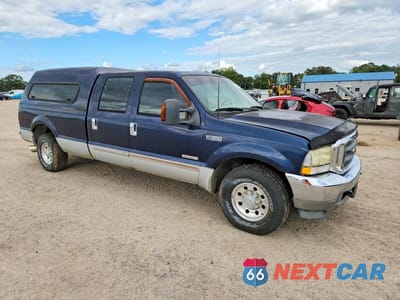 Czwarte zdjęcie samochodu z boku: 2003 FORD F350 SRW SUPER DUTY VIN:1FTSW30P43EC53691 - miniatura