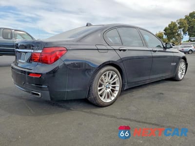 Trzecie zdjęcie samochodu z tyłu: 2015 BMW 740 I VIN:WBAYA6C51FD827028 - miniatura