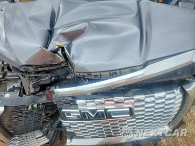Zdjęcie 12 z 14 samochodu: 2021 GMC YUKON DENALI VIN:1GKS2DKL8MR491036 - miniatura