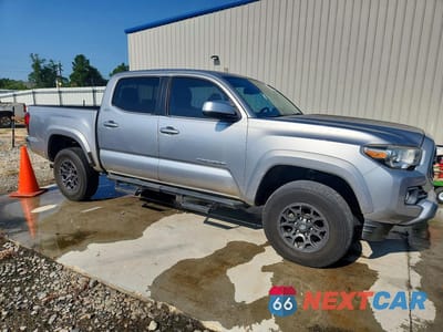 Czwarte zdjęcie samochodu z boku: 2018 TOYOTA TACOMA SR5 V6 VIN:5TFAZ5CN3JX058613 - miniatura