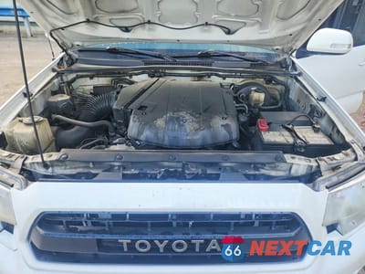 Zdjęcie 11 z 13 samochodu: 2015 TOYOTA TACOMA V6 VIN:5TFLU4EN7FX132802 - miniatura