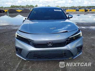 Piąte zdjęcie samochodu w środku: 2022 HONDA CIVIC TOURING VIN:2HGFE1F94NH303746 - miniatura