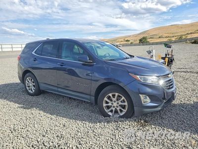 Czwarte zdjęcie samochodu z boku: 2018 CHEVROLET EQUINOX LT VIN:3GNAXJEV9JL120014 - miniatura