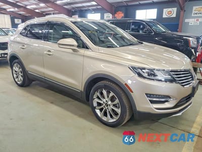 Czwarte zdjęcie samochodu z boku: 2017 LINCOLN MKC SELECT VIN:5LMCJ2D95HUL62174 - miniatura