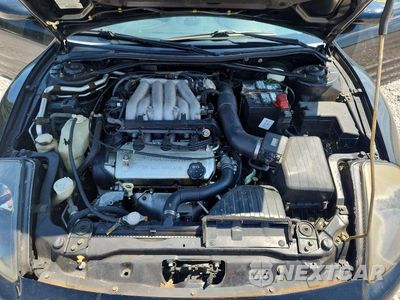 Zdjęcie 11 z 12 samochodu: 2001 MITSUBISHI ECLIPSE SPYDER GT VIN:4A3AE55H71E004114 - miniatura