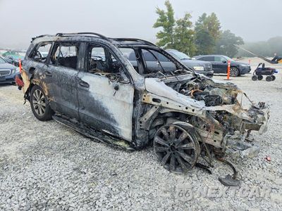 Czwarte zdjęcie samochodu z boku: 2015 MERCEDES-BENZ GL 450 4MATIC VIN:4JGDF6EE1FA547882 - miniatura