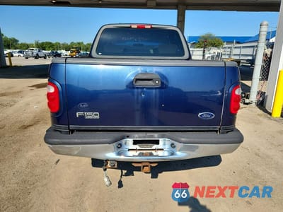 Zdjęcie 6 z 13 samochodu: 2002 FORD F150 SUPERCREW VIN:1FTRW07L92KD44035 - miniatura