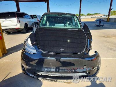 Piąte zdjęcie samochodu w środku: 2021 TESLA MODEL Y VIN:5YJYGDEE7MF245606 - miniatura