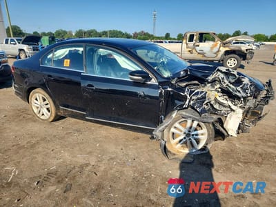 Czwarte zdjęcie samochodu z boku: 2017 VOLKSWAGEN JETTA SEL VIN:3VWL17AJ6HM214393 - miniatura