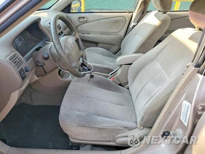 Zdjęcie 7 z 12 samochodu: 2001 TOYOTA COROLLA LE VIN:1NXBR12E81Z458923 - miniatura