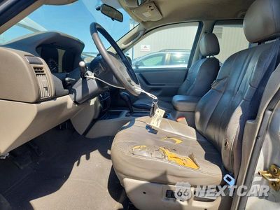 Zdjęcie 7 z 13 samochodu: 2004 JEEP GRAND CHEROKEE LAREDO VIN:1J4GX48S04C386019 - miniatura