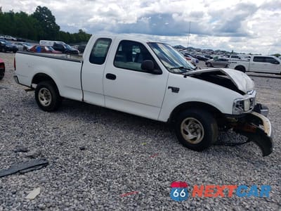 Czwarte zdjęcie samochodu z boku: 2001 FORD F150 VIN:2FTRX17L11CA29932 - miniatura