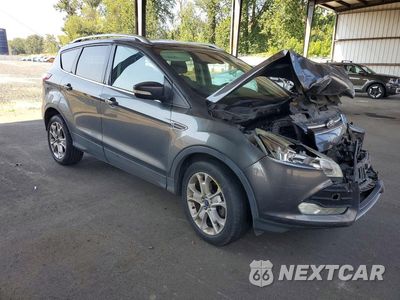 Czwarte zdjęcie samochodu z boku: 2016 FORD ESCAPE TITANIUM VIN:1FMCU0JX3GUC43927 - miniatura