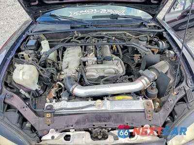 Zdjęcie 11 z 12 samochodu: 2004 MAZDA MX-5 MIATA BASE VIN:JM1NB353040401039 - miniatura