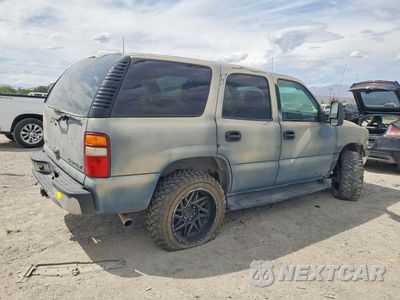 Trzecie zdjęcie samochodu z tyłu: 2003 CHEVROLET TAHOE C1500 VIN:1GNEC13T13R160985 - miniatura