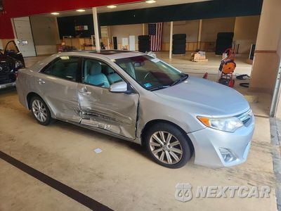 Czwarte zdjęcie samochodu z boku: 2014 TOYOTA CAMRY XLE VIN:4T1BF1FK8EU775728 - miniatura