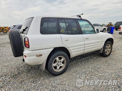 Trzecie zdjęcie samochodu z tyłu: 2000 TOYOTA RAV4 BASE VIN:JT3HP10V9Y7165309 - miniatura